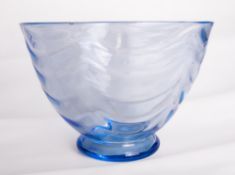 A large 1950's Whitefriars glass wave ribbed and footed bowl in sapphire blue, originally designed