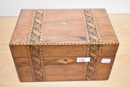 A Victorian Tunbridge ware inlaid ladies box with internal compartments and tray, with key.