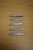 Five advertising pen knives featuring Brasso Metal Polish, The United Yeast Company Ltd and