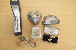 A small assortment of jewellery including a silver and amethyst Celtic motif bracelet, a preserved