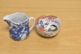 A 19th Century blue and white porcelain miniature jug, measuring 5cm, and a Chinese polychrome