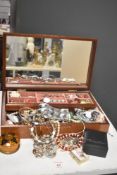 A wooden jewellery box, comprising a large assortment of mostly costume jewellery, including a