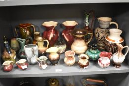 A collection of 20th Century lustre and drip glazed studio ceramics, to include jugs and vases,