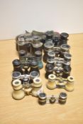 Eleven pairs of 19th/20th Century opera glasses and cases, including two pairs of bone opera