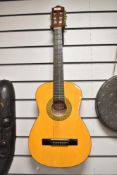 A junior sized classical guitar, by Stagg
