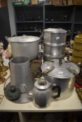 A collection of vintage aluminium pots, pans, pressure cooker etc.