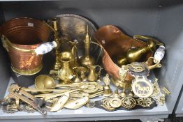 A selection of various brass and copper wares, to include a brass and copper bucket, coal helmet,
