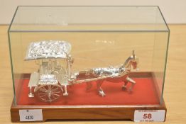 A mid-20th Century continental silver horse and cart study, with repousse decoration and stamped '
