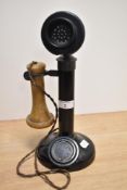 An early 20th Century candlestick telephone and receiver, measuring 30cm high