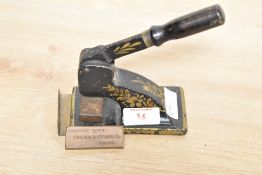 A Victorian cast iron desk letter head seal, measuring 14cm high