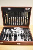 A mid-20th Century canteen of Oneida stainless steel cutlery