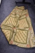 A vintage patchwork quilt in green and gold, measures 264cm x 264cm.