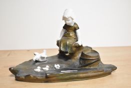 An Ernest Justin Ferrand , 1856-1932 Art Deco ink stand, having cast metal and porcelain depiction