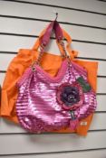 An original by Sharif 1827 pink sequin shoulder bag with floral motif, sold with dust cover.