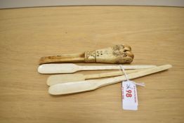 A group of four 18/19th century bone marrow scoops, three of traditional form, the other retaining