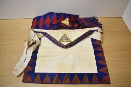 A Masonic kid leather apron with matching sash.