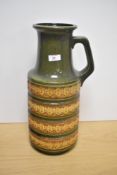 A 1970s West German Scheurich Keramik pottery vase, 429-45 impressed to the base, against a green