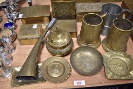 A collection of brassware, including tea caddy, ashtrays, tankards, a lidded bowl etc.