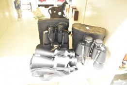 Three pairs of binoculars, Traveller 10/30x60, Prinzlux 10x50 and Prinz 10x50, all with cases.