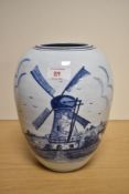 A large ovoid Delft design vase, hand decorated with typical windmill scene, 24cm U shaped hairline