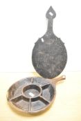 A primitive wooden compartmentalised spice tray and wooden bakers paddle, thought to be Indian.