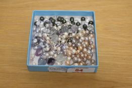 A collection pearl and beaded necklaces, comprising a purple pearl and amethyst chip necklace, a