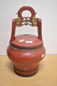 A 19th century Asian red lacquered bucket or wedding basket, having seal mark to lid and metal