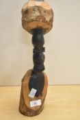 An African carved hardwood bust.
