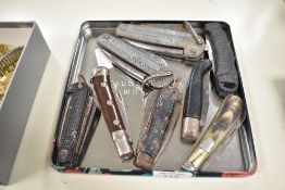 A group of eight vintage pen knives.