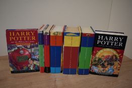 Children's Literature. Rowling, J. K. Harry Potter series. A set of the seven novels. Hardbacks in