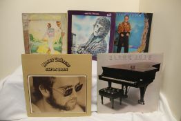 A ten album Elton John with some duplicate titles
