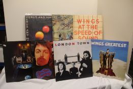 A seven album Wings lot with a couple of duplicate titles - Beatles / Macca interest