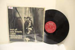 A Rolling Stones rare UK Mono ' Out of our Heads ' press VG sleeve with some fading / front is in