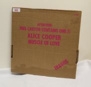 A copy of Alice Cooper's ' Muscle of Love ' comes in the limited box packaging , the water mark in