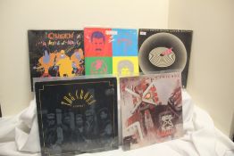 A lot of ten Queen and related titles - sleeves range from VG to VG+ and overall the vinyl is