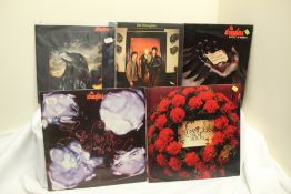 A lot of Stranglers records - twelve in total with a couple being 12 inch singles - classic stuff on