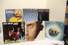 A lot of Jean Michel Jarre albums - seven in total - some with sleeves issues as in photos - same