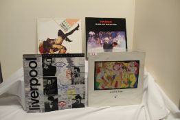 A lot of four records by Frankie Goes to Hollywood