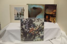 A Pink Floyd four record lot with pressings from the United States and Italy on offer