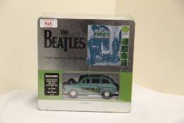 A Beatles limited edition die cast car / t-shirt and plaque set - sealed official Apple merchandise