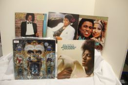 A lot of four Michael Jackson albums