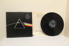 A Pink Floyd DSOTM with 2 original posters - a nice piece in VG+/VG+ with posters in lovely