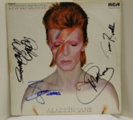 A signed David Bowie - Ziggy Stardust album sleeve , all signatures have been attained at the