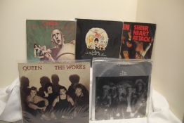 A lot of ten Queen and related titles - sleeves range from VG to VG+ and overall the vinyl is