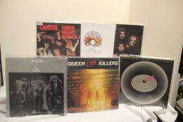 A lot of ten Queen titles - sleeves range from VG to VG+ and overall the vinyl is VG+ - good