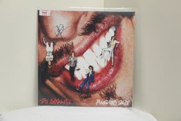 A Darkness fully signed vinyl album ' Pinewood Smile ' on the Cooking Vinyl label - we cannot