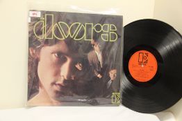A UK Doors Elektra debut Stereo press - VG/VG with marks - plays above grade - classic UK psych