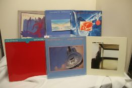 A lot of four albums by Dire Straits