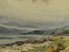 Jack Merriott (1901-1968, British), watercolour, A lakeside with snowy hills in the distance, signed