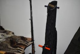 A Boss Tackle developments rod carry bag containing 2 Dunlop 3pc 11ft carp rods and rod rests